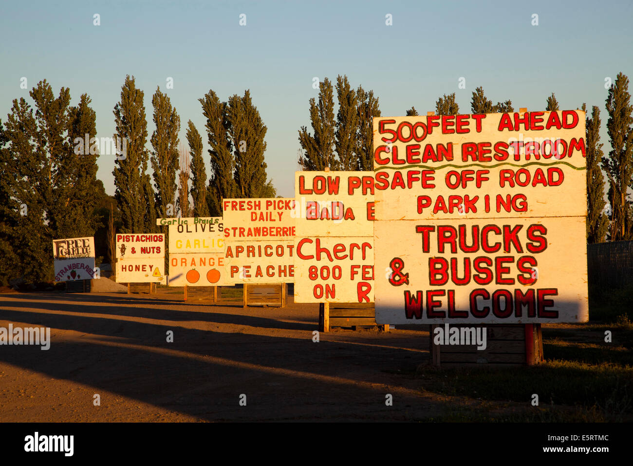 signs for a fruit stand in between Gilroy and Los Banjos, California