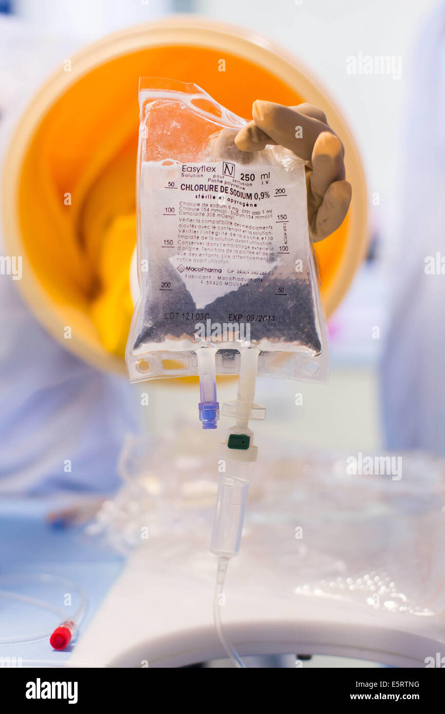 Kemo Box Method A compounder is preparing chemotherapy treatments under glove box ...