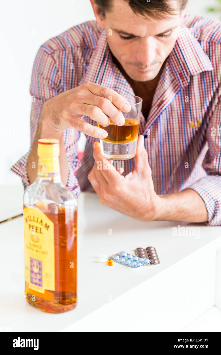 Alcohol Rong Wrong association of alcohol and medications Stock Photo - Alamy