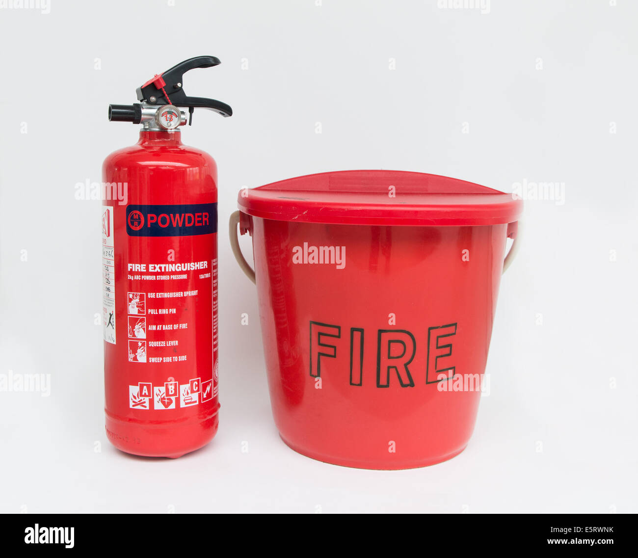 Fire extinguisher and Sand bucket Stock Photo