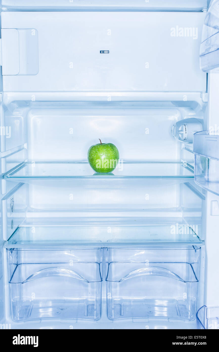 Apple in a fridge Stock Photo Alamy
