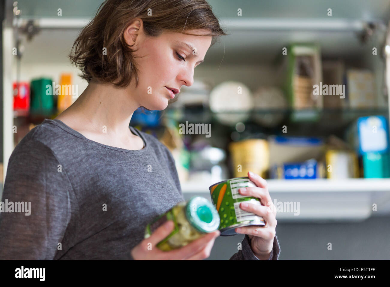 Woman checking the composition and nutrition facts. Stock Photo