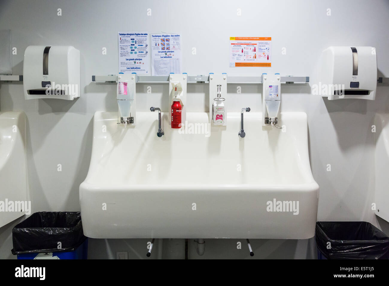 Surgical wash station, Scrub taps and soap dispensers in an operating