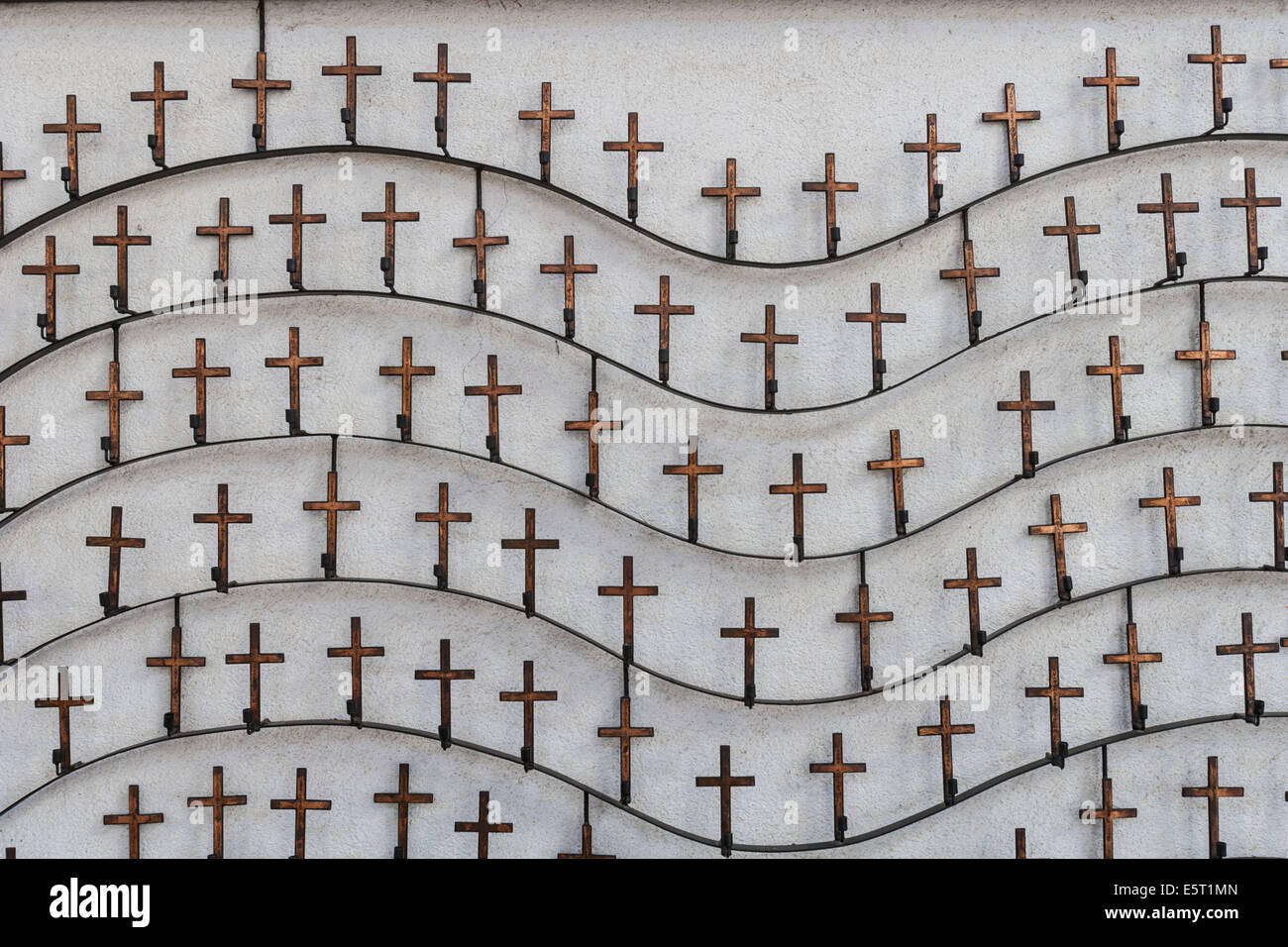 Catholic crosses on a church wall Stock Photo Alamy