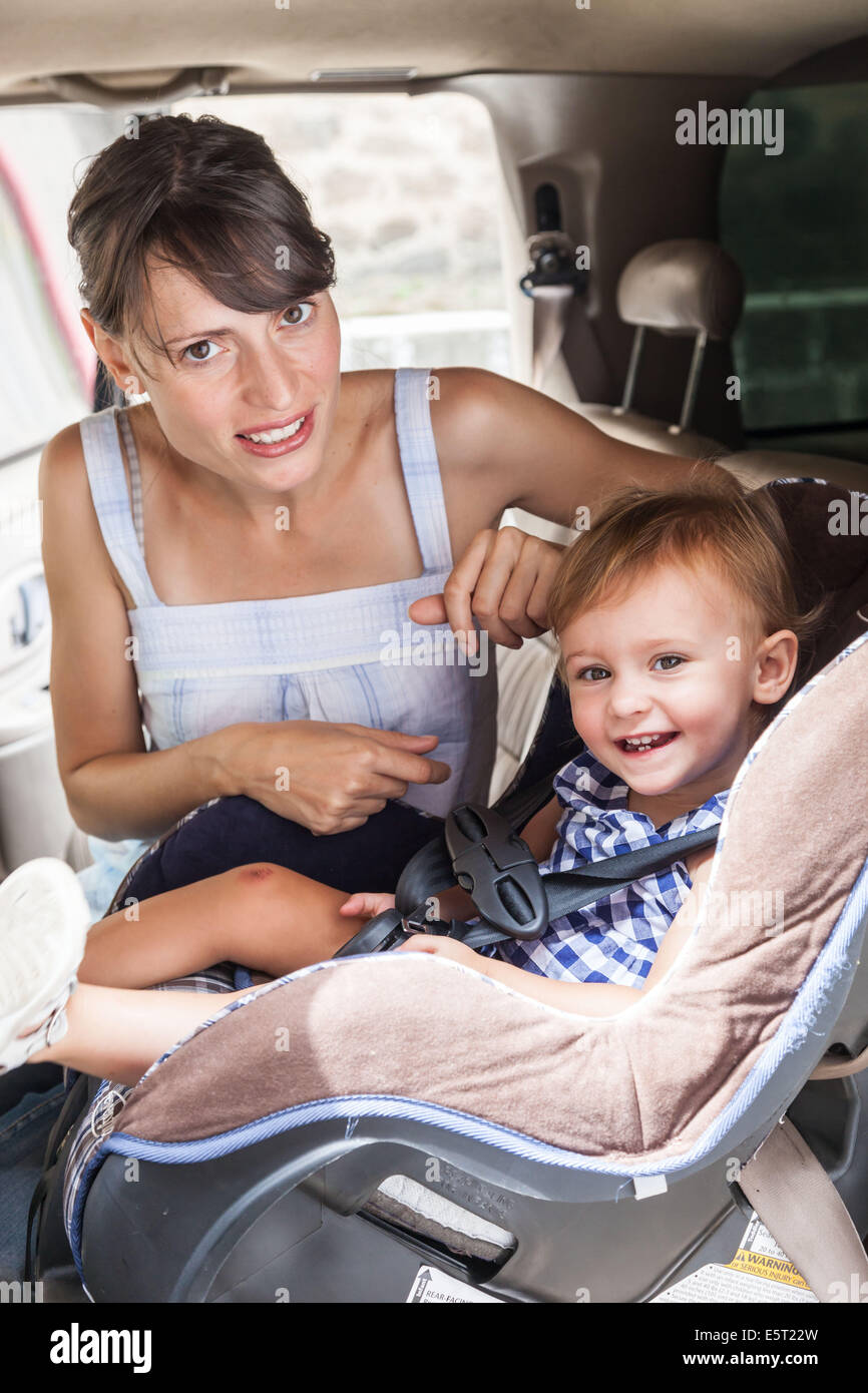 20 month old baby girl on a baby car seat Stock Photo Alamy