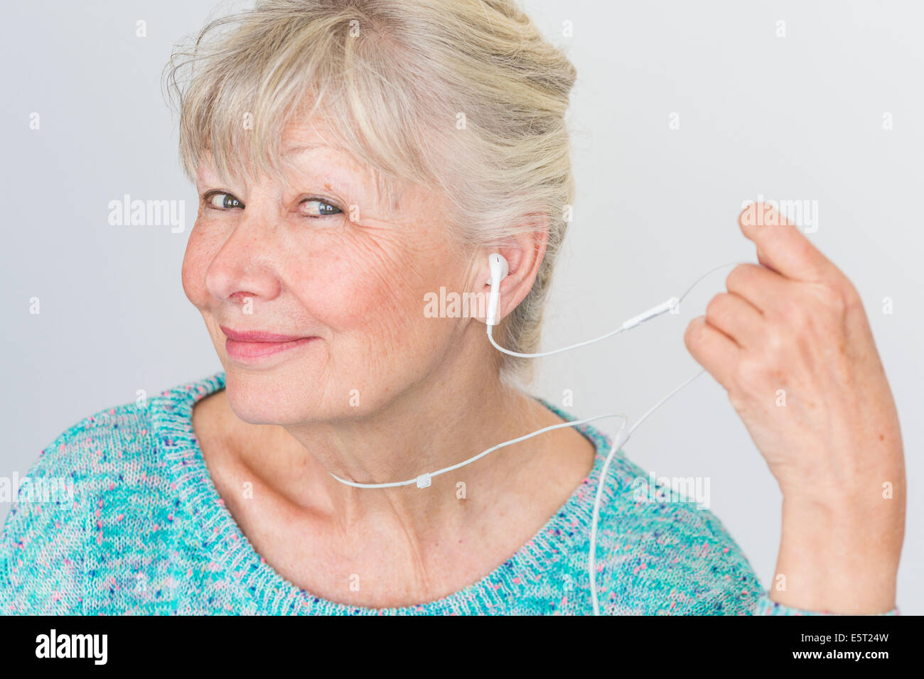 Woman listening to music Stock Photo Alamy