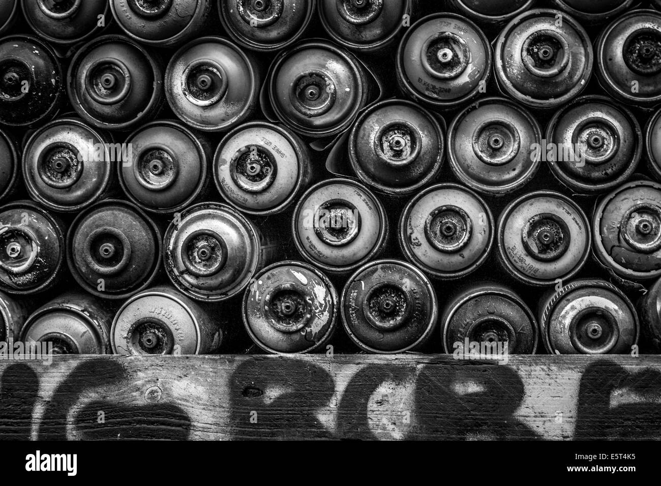 Black spray paint metal cans isolated on white Stock Photo by