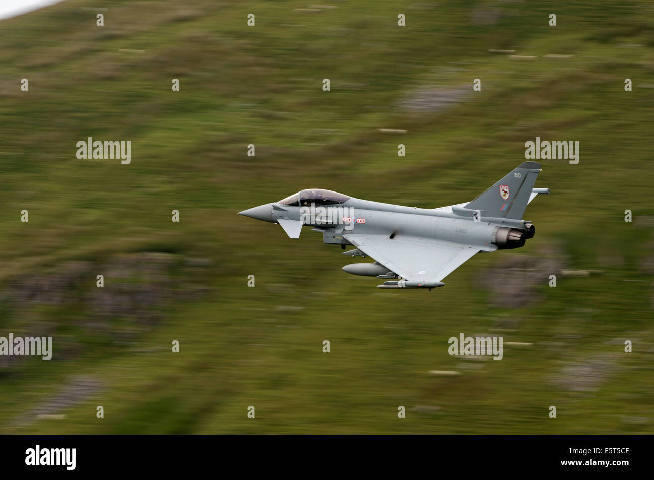 RAF Typhoon (Eurofighter) flying low level in Wales Stock Photo