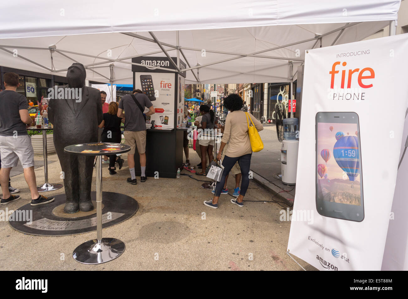 An AT&T kiosk set up in Union Square in New York promotes their ...