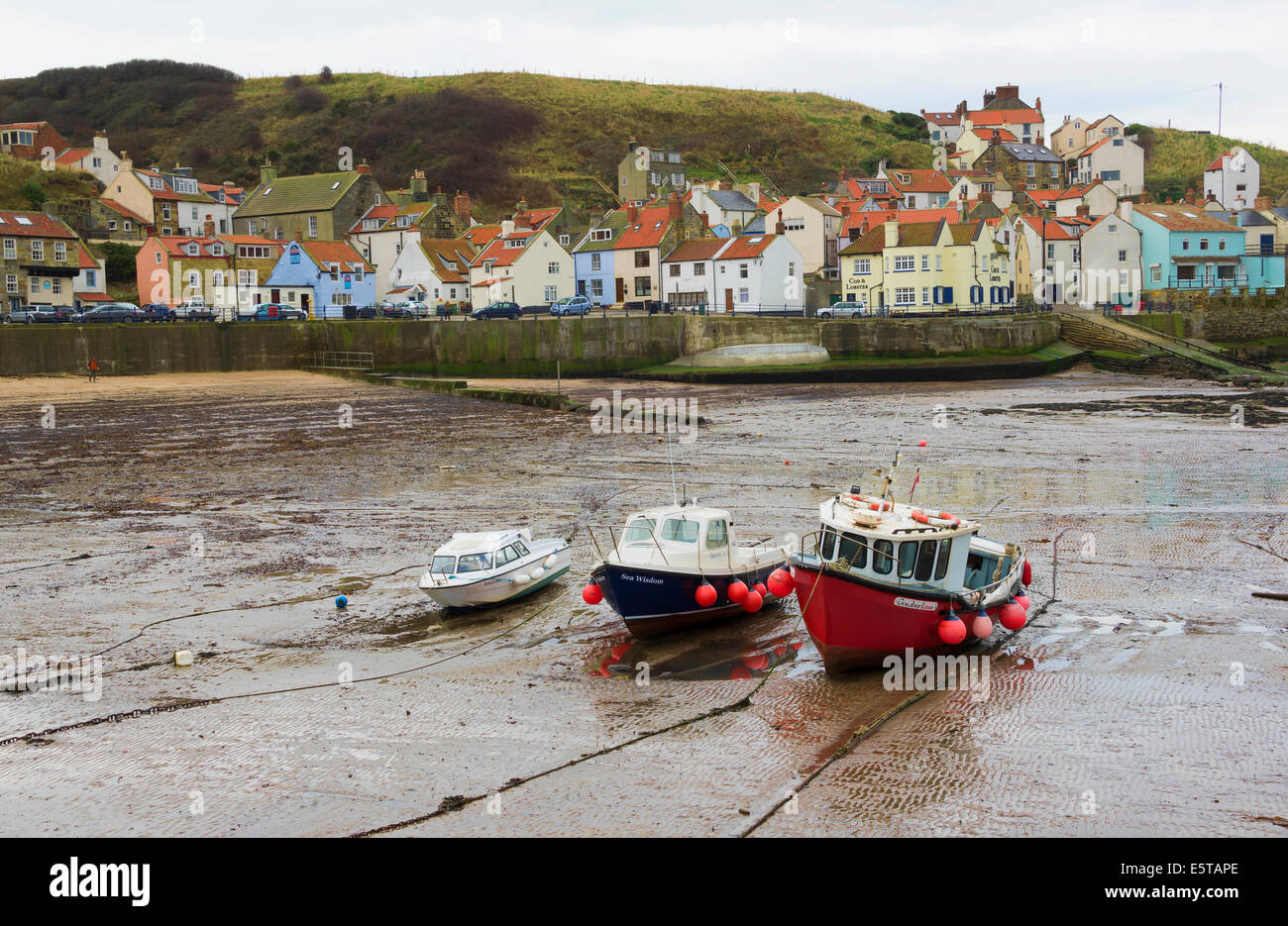 Fishing Boats in Staithes Harbour Stock Photo - Alamy