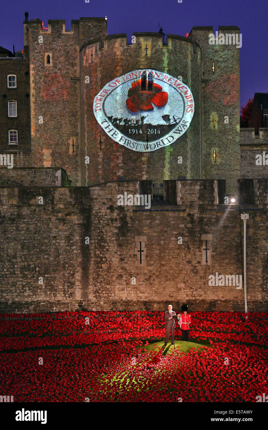 London, UK. 5th August 2014. Tim Pigott-Smith at the opening of the  Blood Swept Lands and Seas of Red artwork by Paul Cummins at the Tower of London. 888,246 ceramic poppies, each poppy representing a British or Colonial military fatality during the war, will fill the moat by November 11th. For the opening, battlefield images were projected onto the central tower while Tim Pigott-Smith read out names of the fallen during a 21 gun salute. The evening ended with the playing of the last post. Credit:  Paul Brown/Alamy Live News Stock Photo