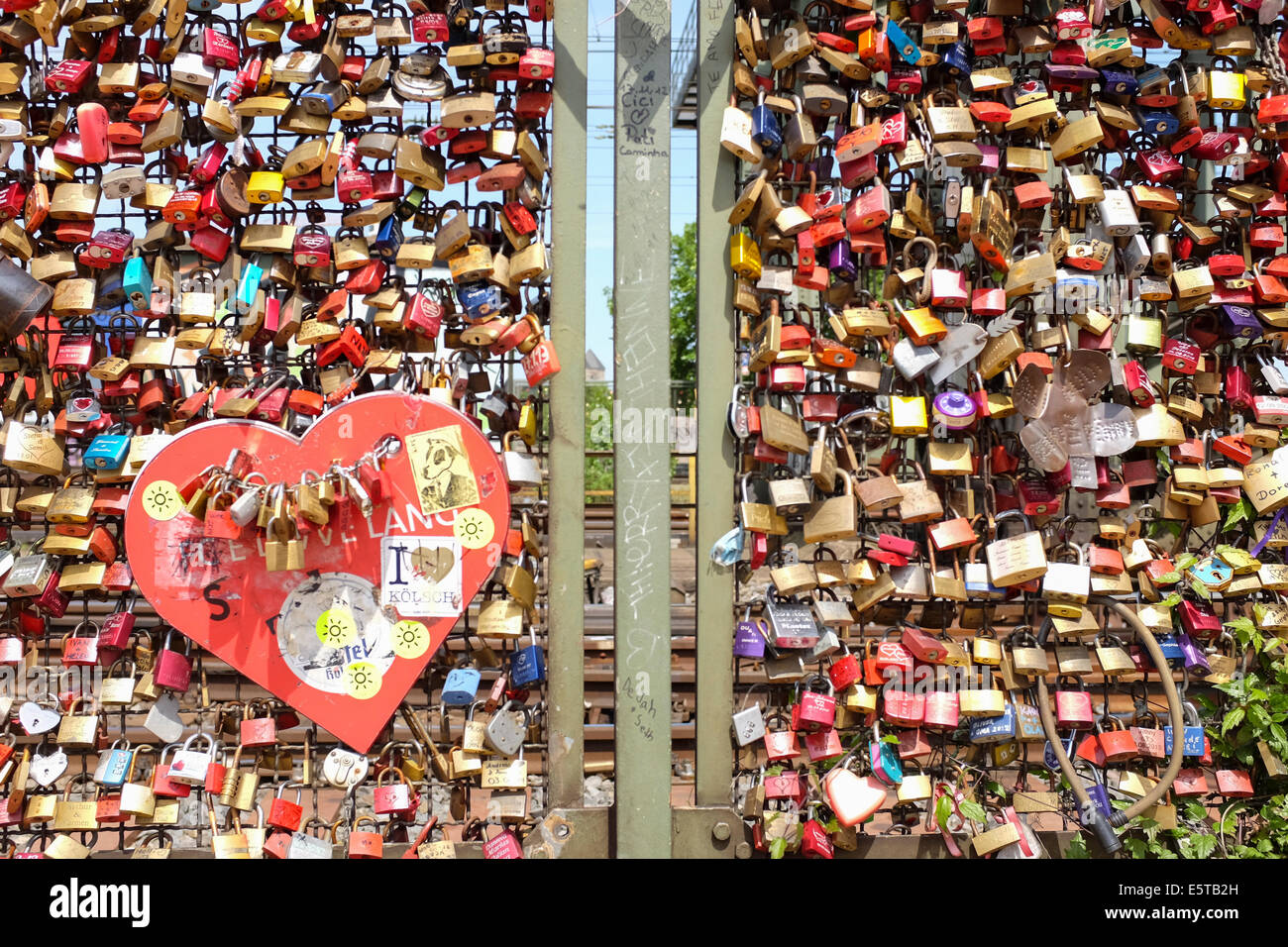Padlocks symbolizing love forever on the wall of love in the Hohenzollern Bridge in Cologne, Germany Stock Photo