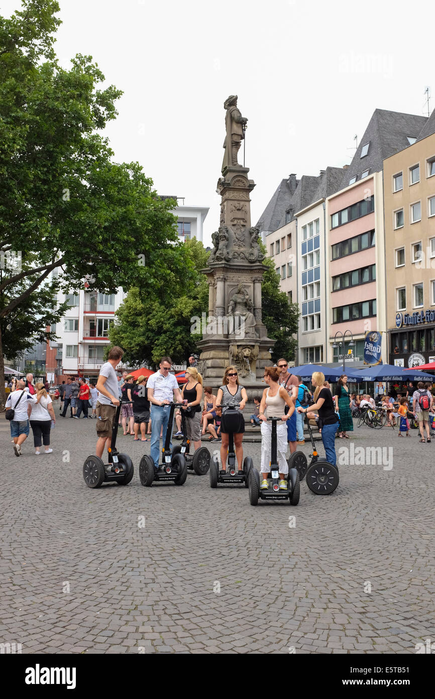 Segway tour at the Marketplace in the City Centre of Cologne, Germany Stock Photo