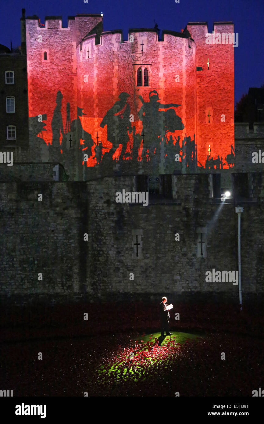 London, UK. 5th August 2014. Tim Pigott-Smith at the opening of the  Blood Swept Lands and Seas of Red artwork by Paul Cummins at the Tower of London. 888,246 ceramic poppies, each poppy representing a British or Colonial military fatality during the war, will fill the moat by November 11th. For the opening, battlefield images were projected onto the central tower while Tim Pigott-Smith read out names of the fallen during a 21 gun salute. The evening ended with the playing of the last post. Credit:  Paul Brown/Alamy Live News Stock Photo