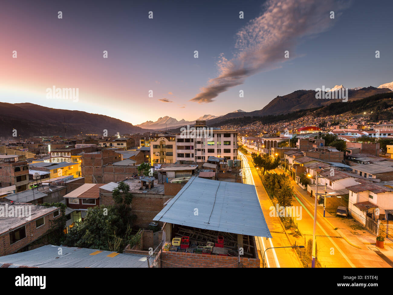 Am evening view over the city of Huaraz with the mountains of Cordillera Blanca in the background, Huaraz, Peru, South America Stock Photo