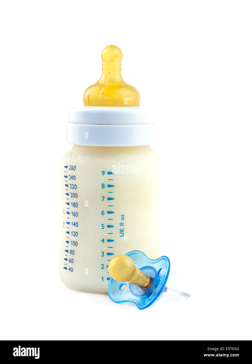 baby bottle and pacifier on a white background Stock Photo