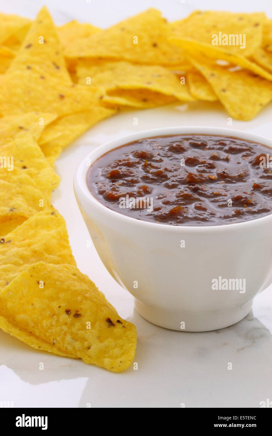 Artisan mexican chipotle sauce on vintage carrara marble table, with a delicious smoky flavor perfect for all your Mexican, tex- Stock Photo