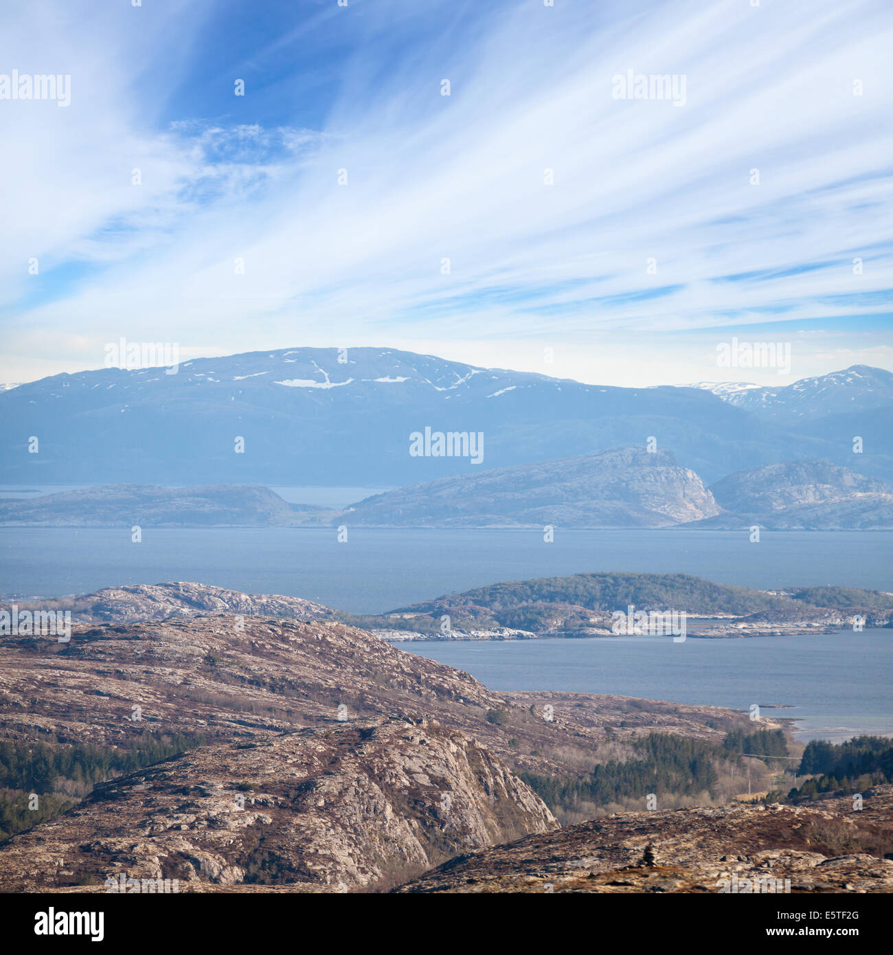 Norwegian sea coastal landscape with sea, sky and rocks Stock Photo