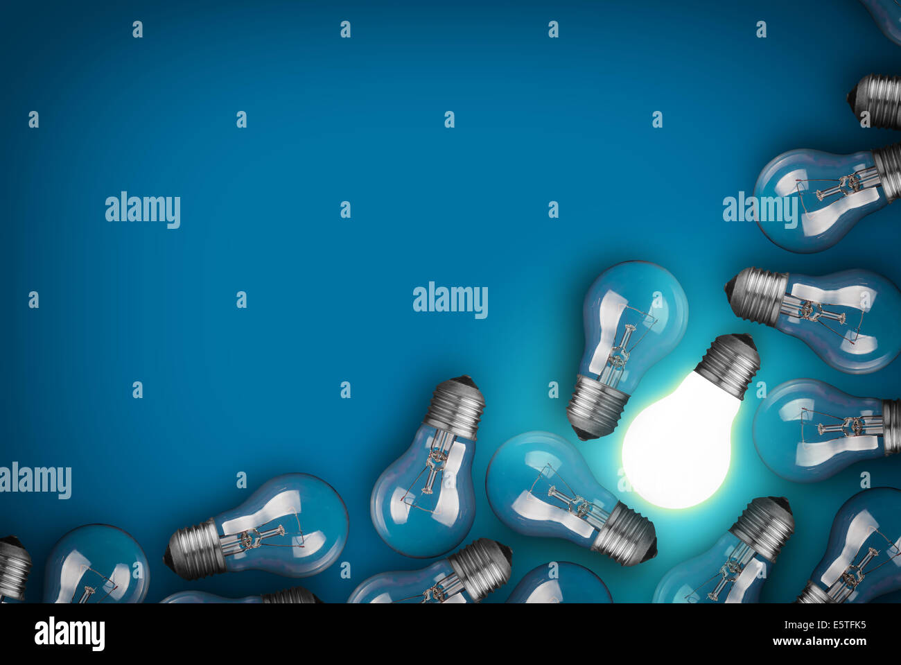 Idea concept with light bulbs on blue background Stock Photo - Alamy