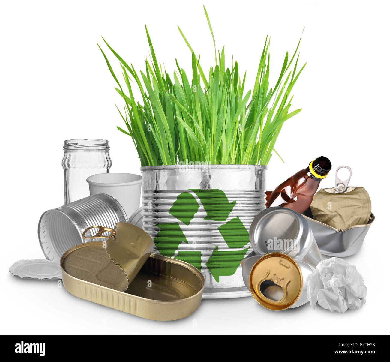 Can with growing grass and trash for recycle Stock Photo