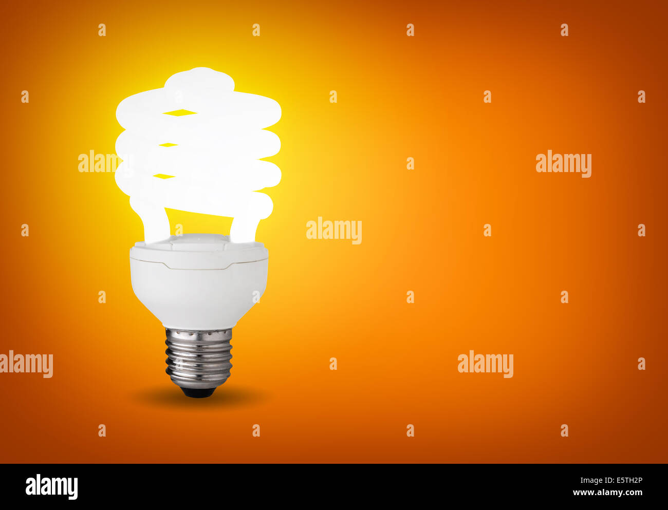Idea concept with glowing energy saver bulb Stock Photo - Alamy