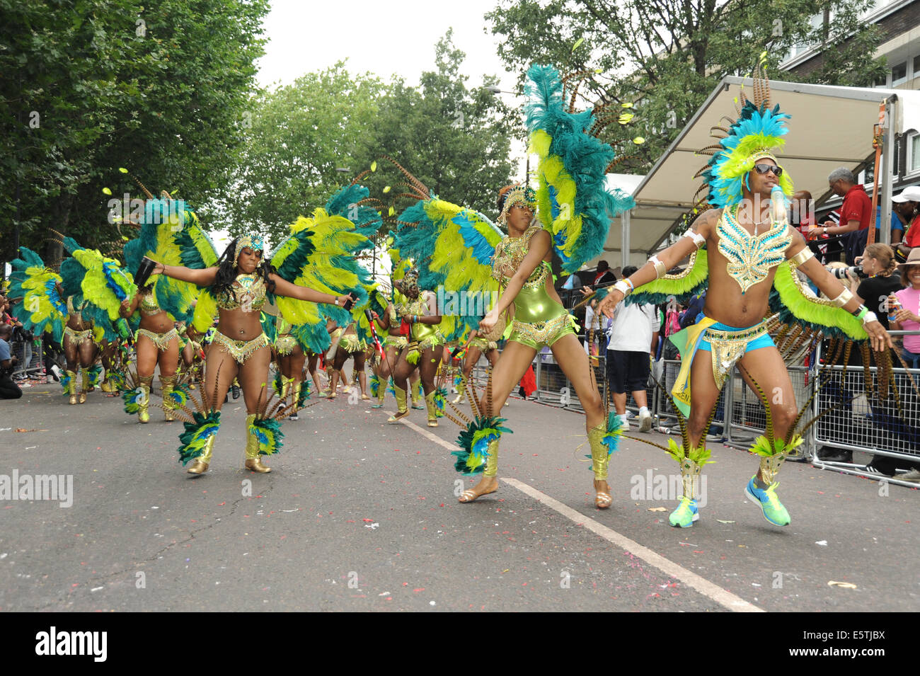 Notting Hill Carnival participants wearing traditional Caribbean costumes Stock Photo