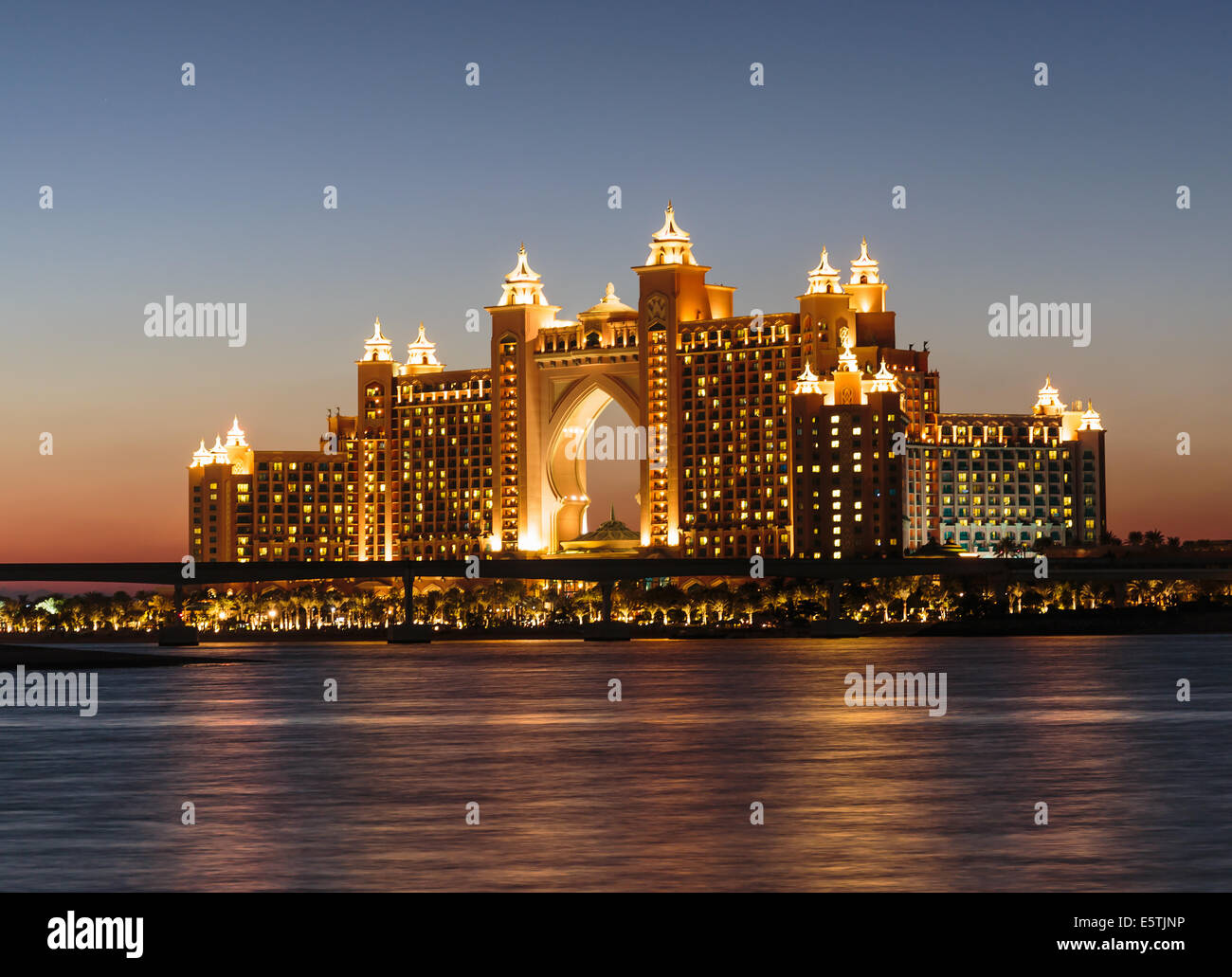 DUBAI, UAE-NOVEMBER 7: Night view Atlantis Hotel on November 7, 2013 in Dubai, UAE. The resort consists of two towers linked by Stock Photo