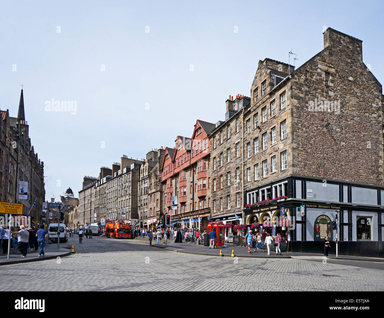 View up Lawnmarket in the Royal Mile Edinburgh Scotland with shops and pubs Stock Photo