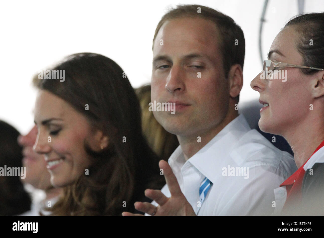 Prince William, Princess Catherine and Prince Harry in the crowd at the Tollcross International Swimming Centre, Stock Photo