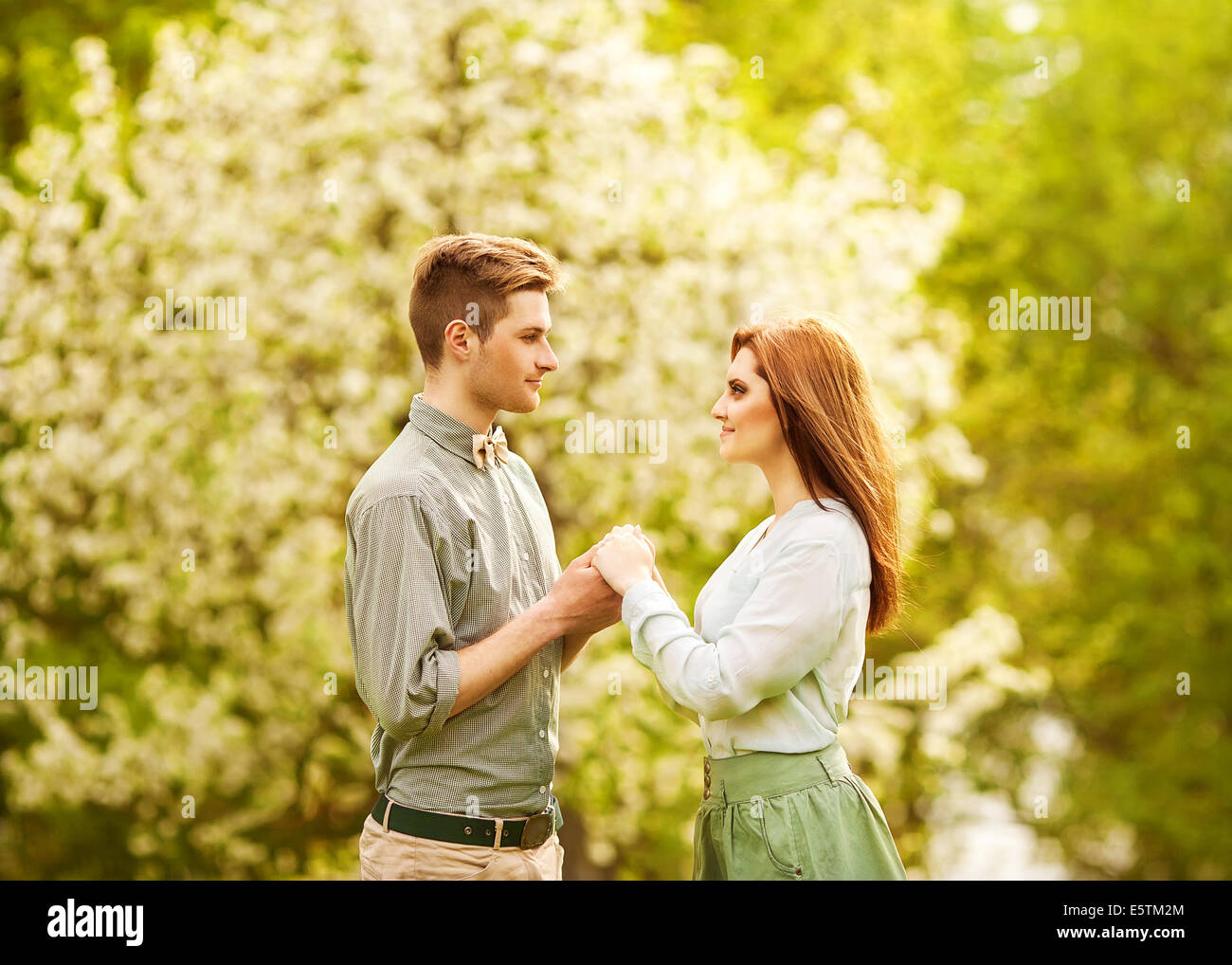Teen couple walking holding hands hi-res stock photography and images ...