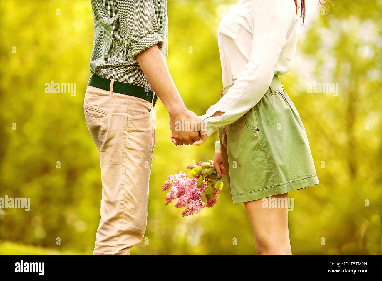 Teen couple walking holding hands hi-res stock photography and images ...