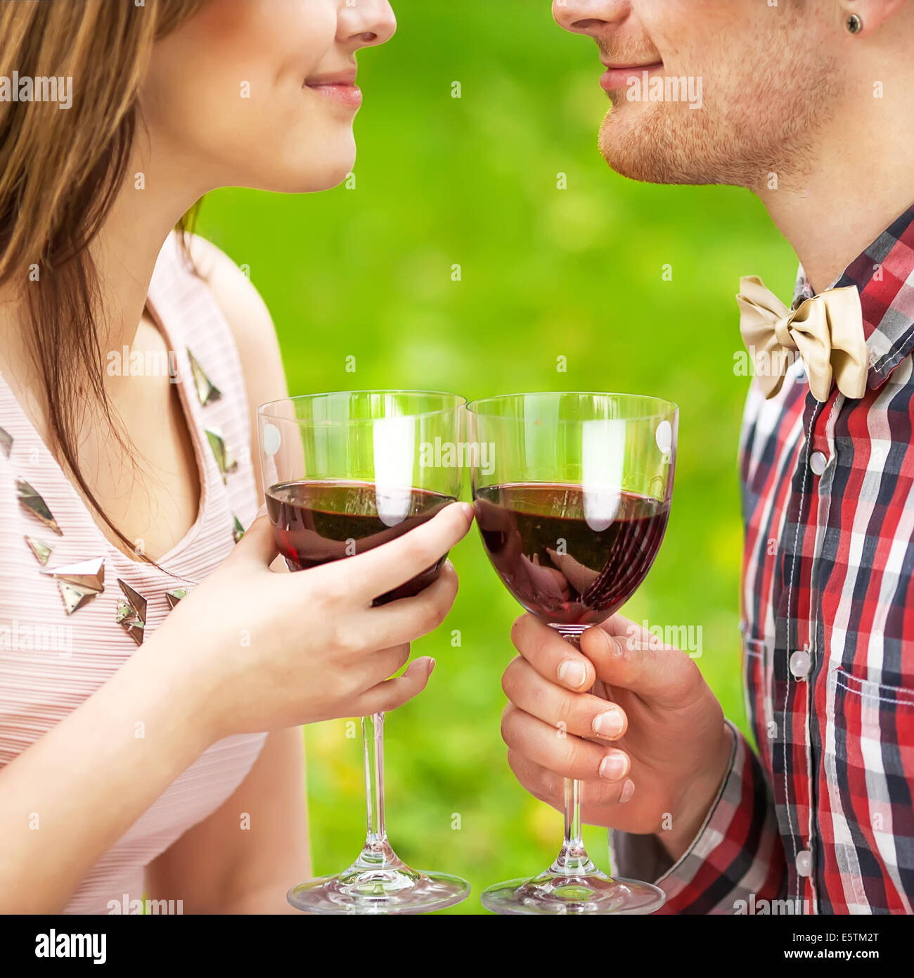 Young couple drinking wine Stock Photo - Alamy