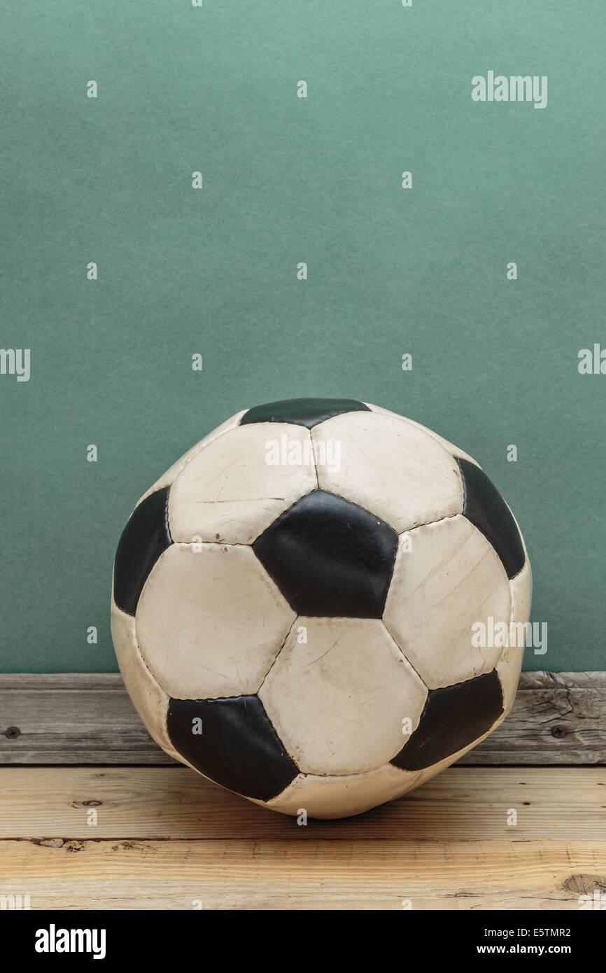 old deflated soccer ball Stock Photo Alamy