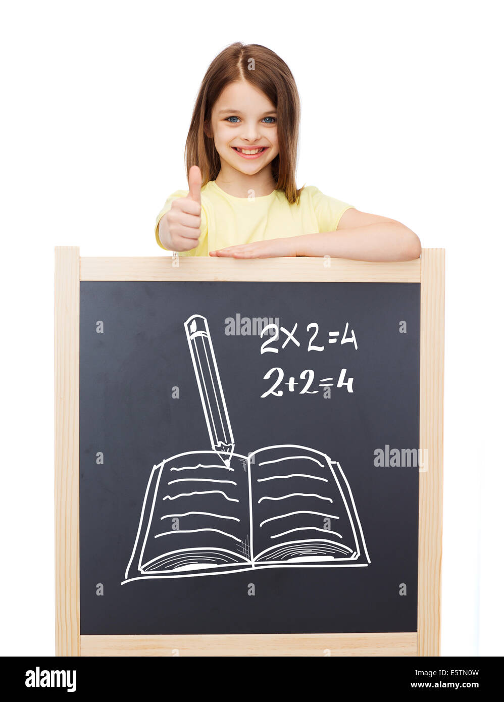 smiling girl with blackboard showing thumbs up Stock Photo - Alamy
