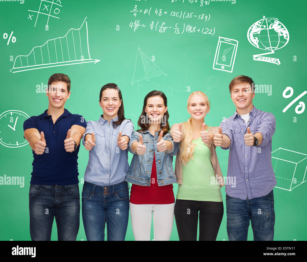 group of smiling students showing thumbs up Stock Photo - Alamy