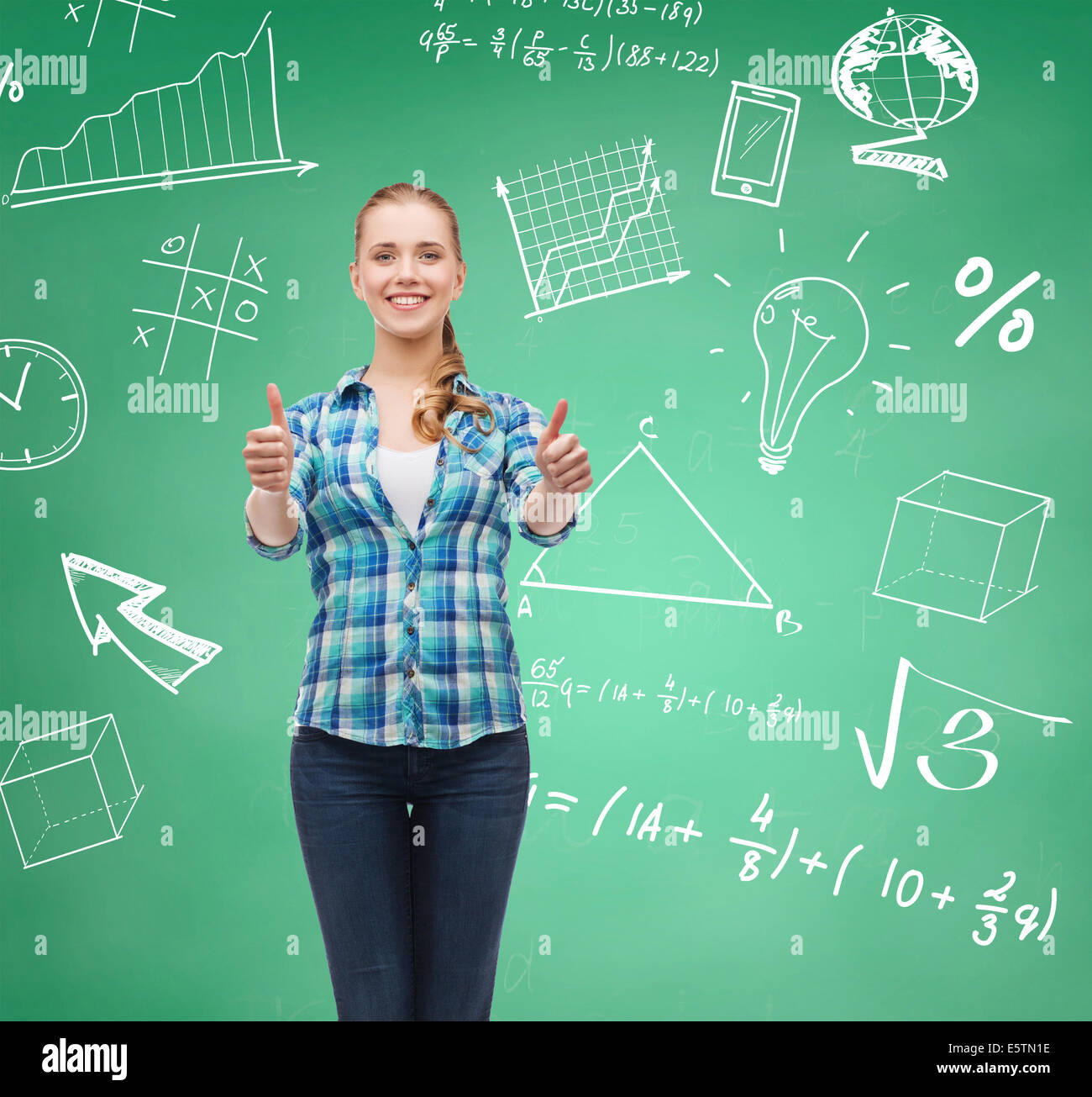 smiling student girl showing thumbs up Stock Photo - Alamy