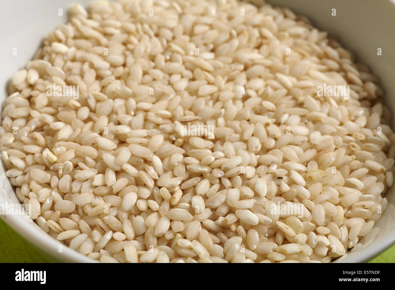 raw uncooked Arborio rice Stock Photo Alamy