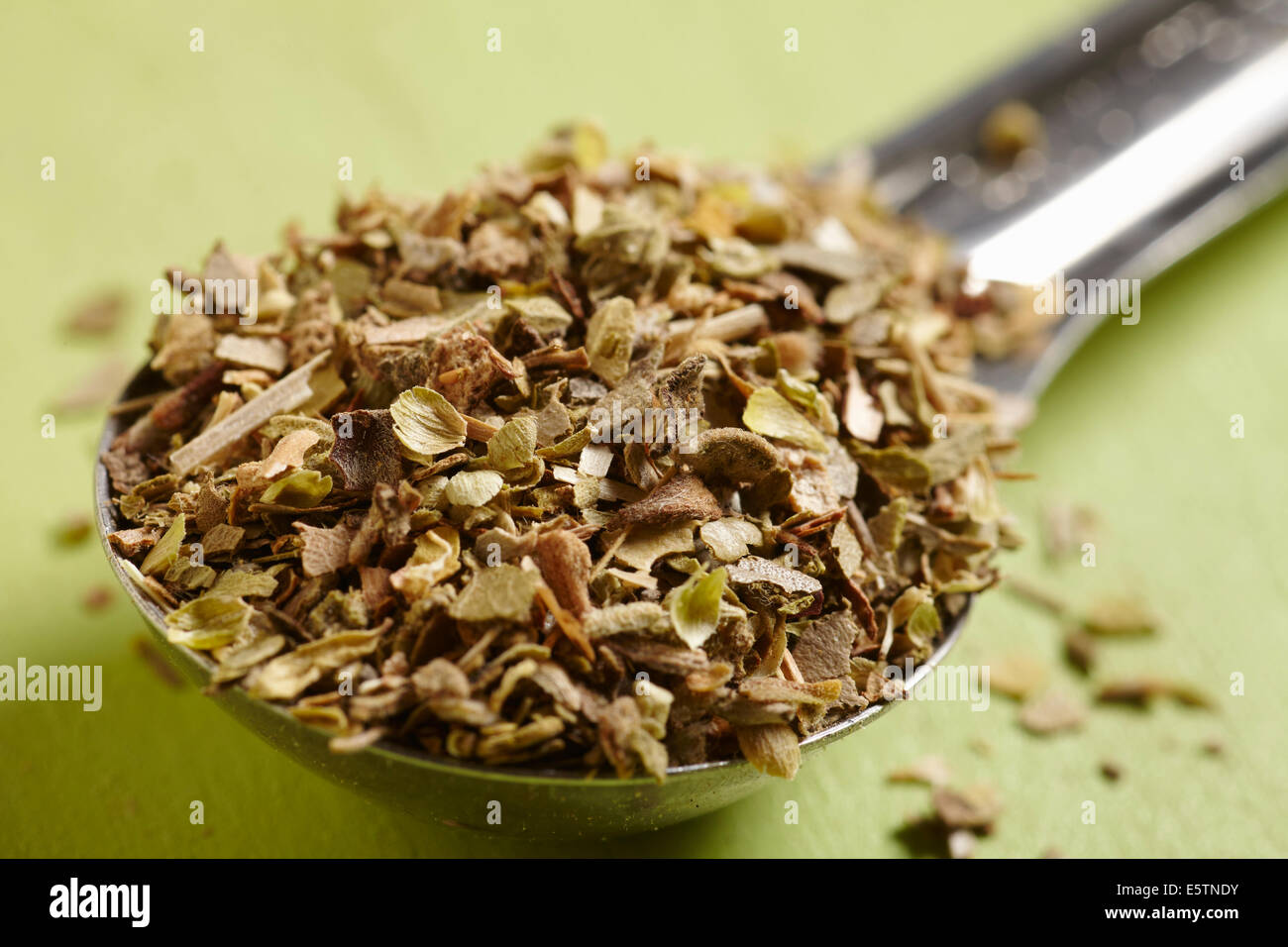 A teaspoon of dried oregano Stock Photo