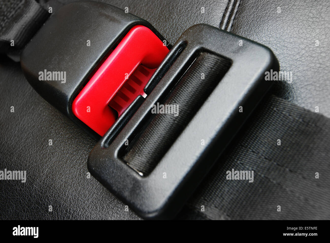 seat belt on a black leather chair Stock Photo Alamy