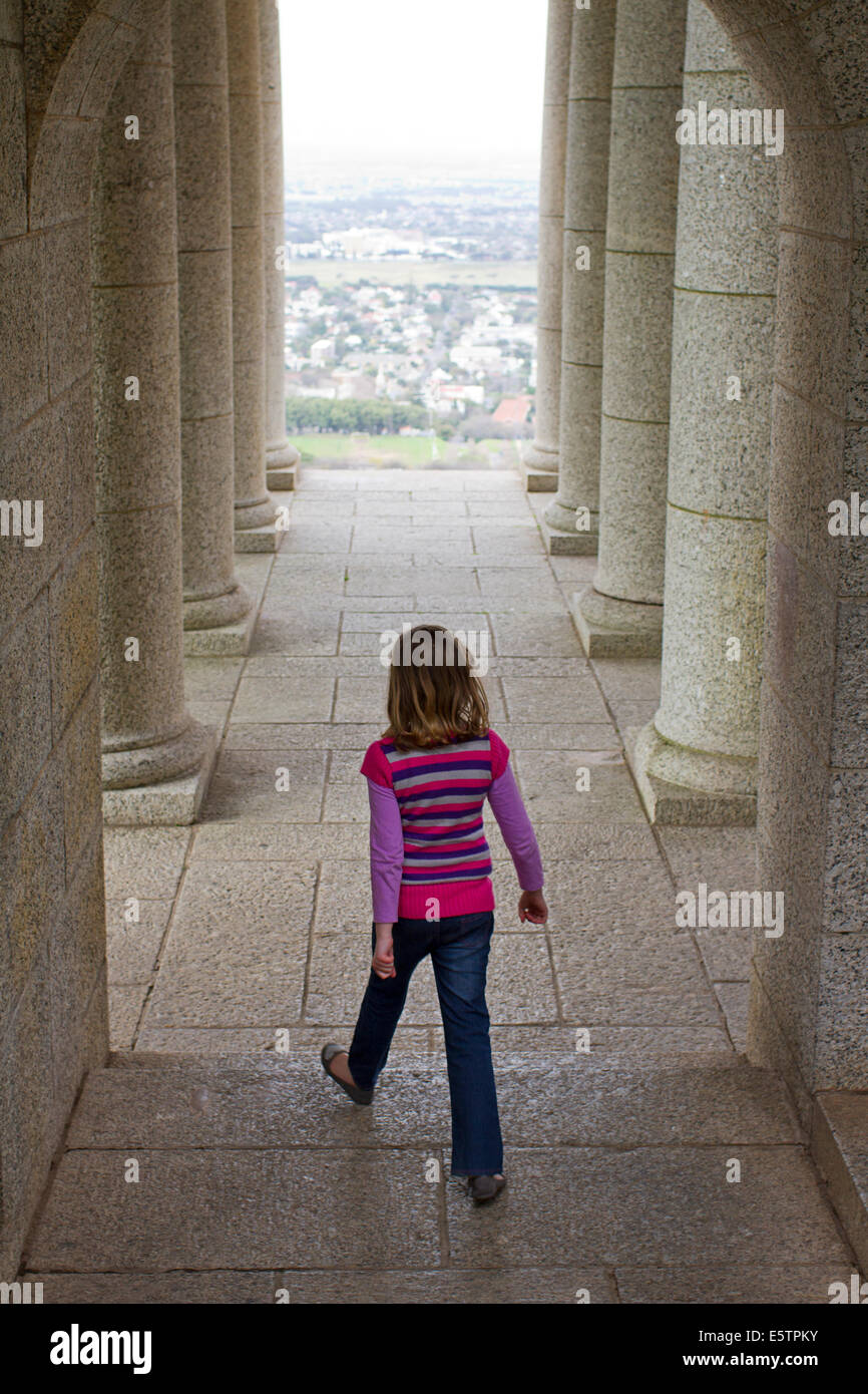 Girl walking between pillars at Rhodes Memorial Stock Photo