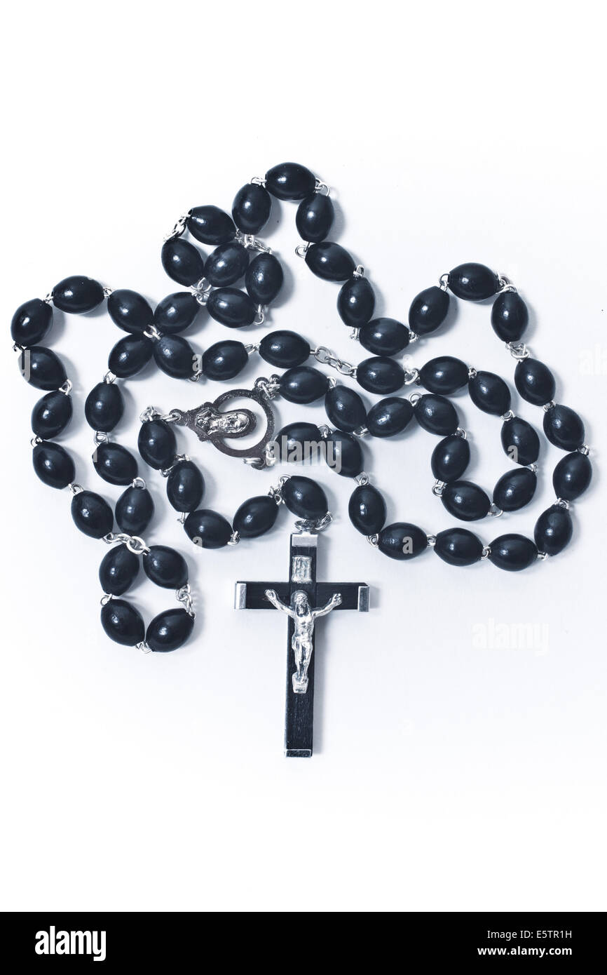 Catholic rosary with crucifix on white background Stock Photo - Alamy