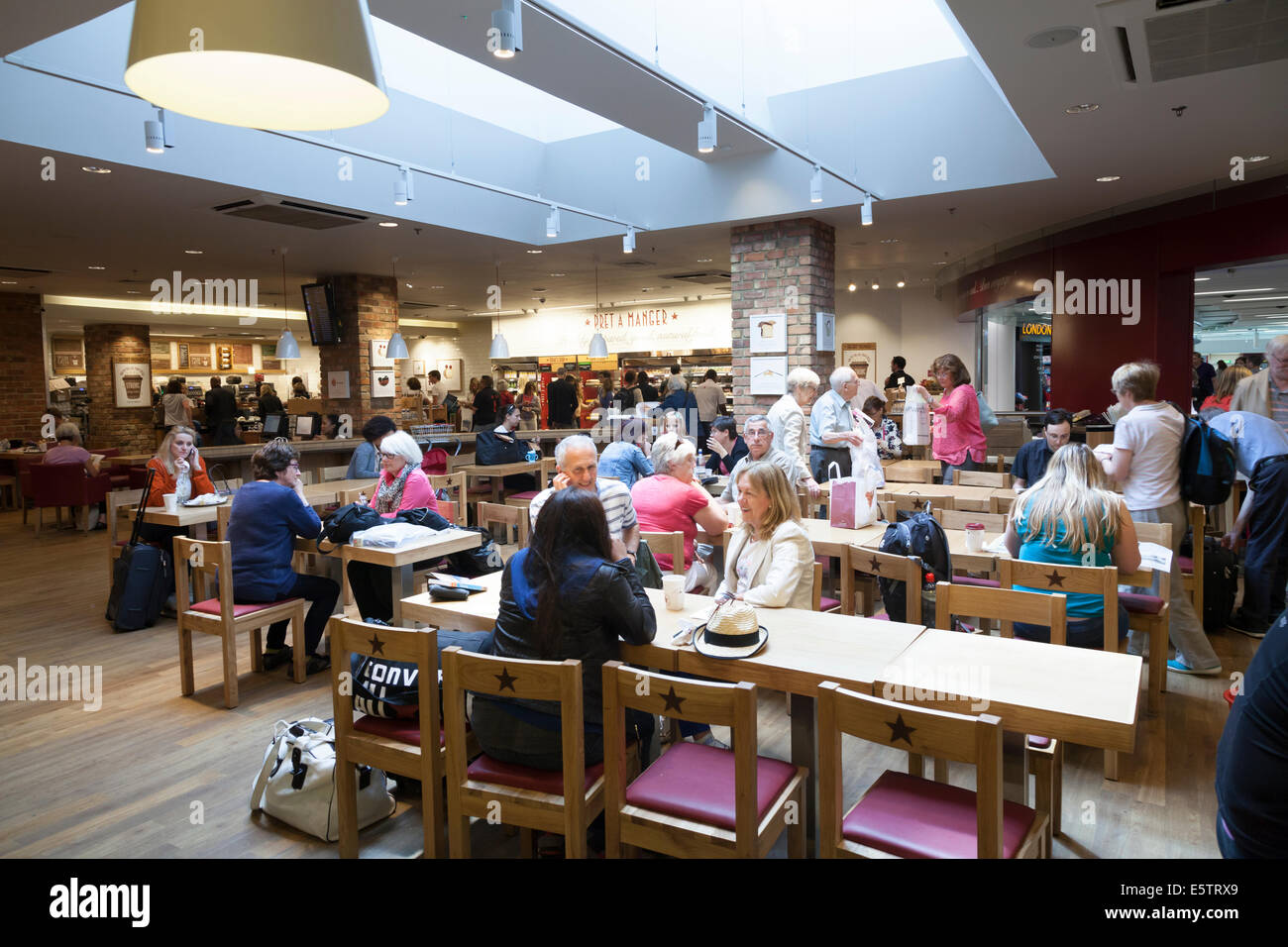 Restaurant area in airport departure lounge. Stock Photo