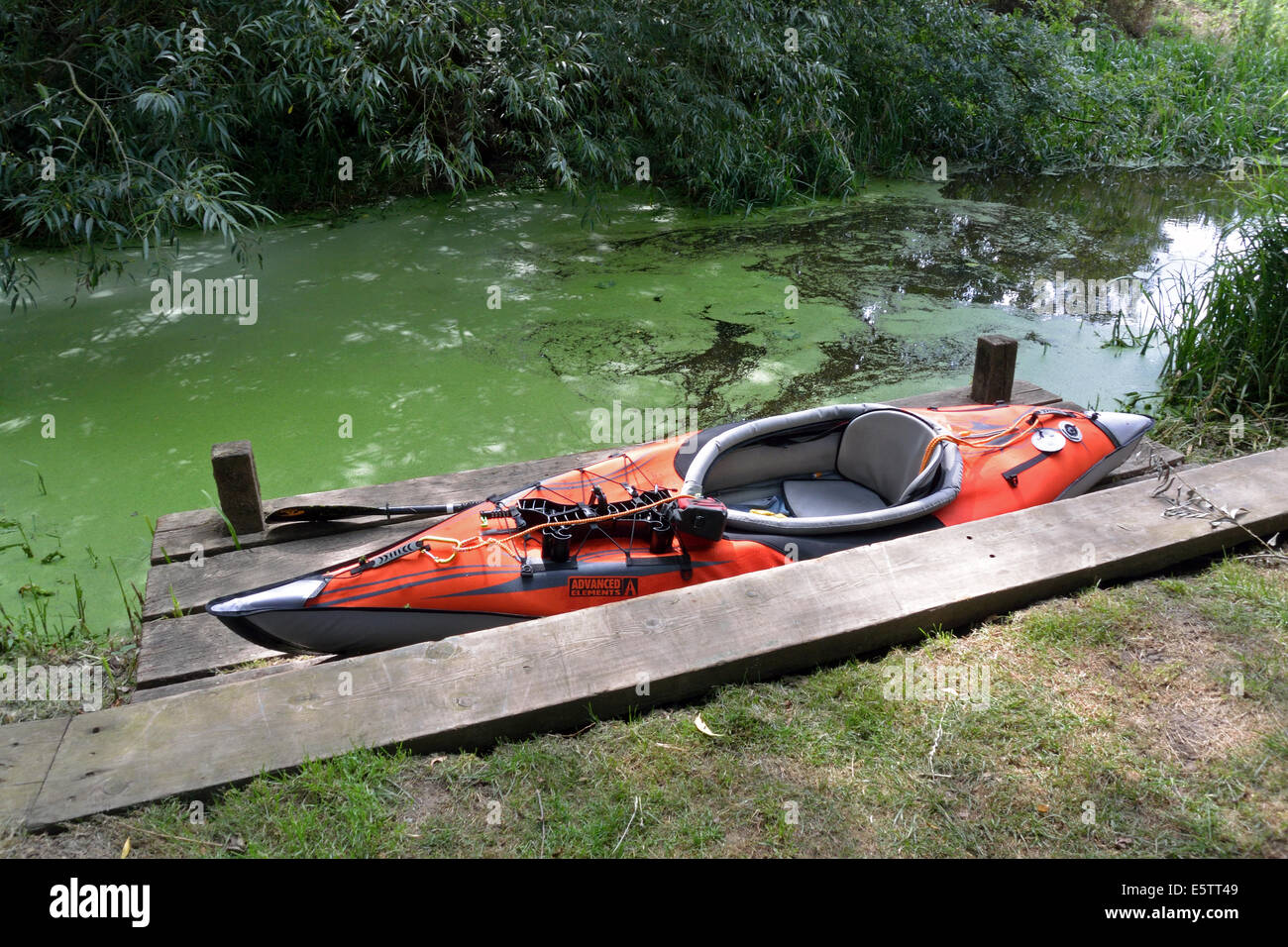 Kayak on platform at Wormingford Mill canoe portage point, River Stour, Suffolk / Essex Stock Photo