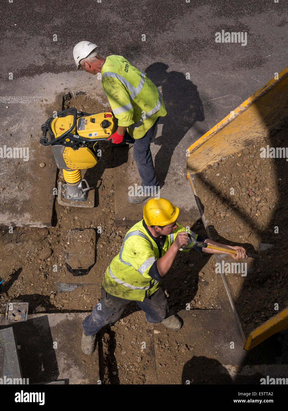 UK Roadworks Repair and replacement of underground water mains pipework by contractors - Amey Stock Photo