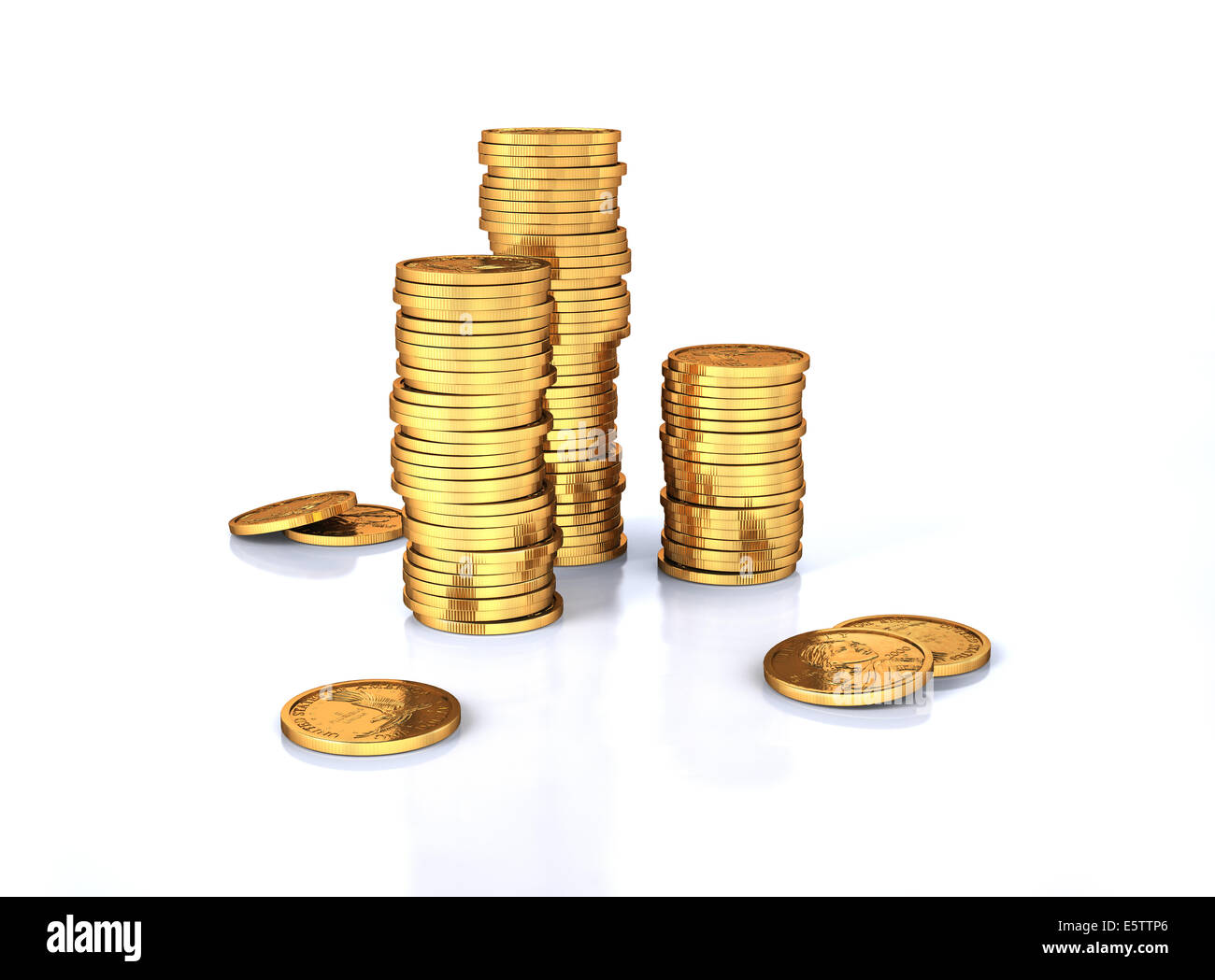 Gold dollar coins stacks and a few lose on a white surface, slightly reflective. White background. Stock Photo