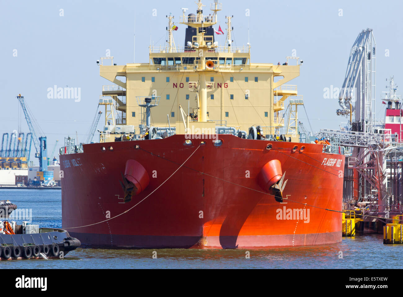 Oil tanker moored near an oil silo in Port of Antwerp July 9,2013 in Antwerp, Belgium. Stock Photo