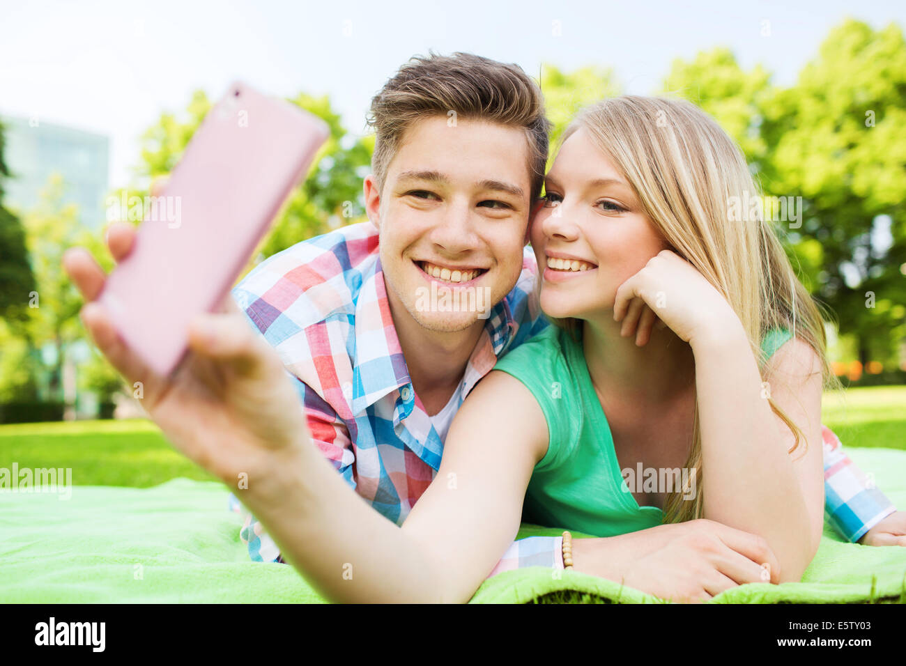 smiling couple in park Stock Photo - Alamy