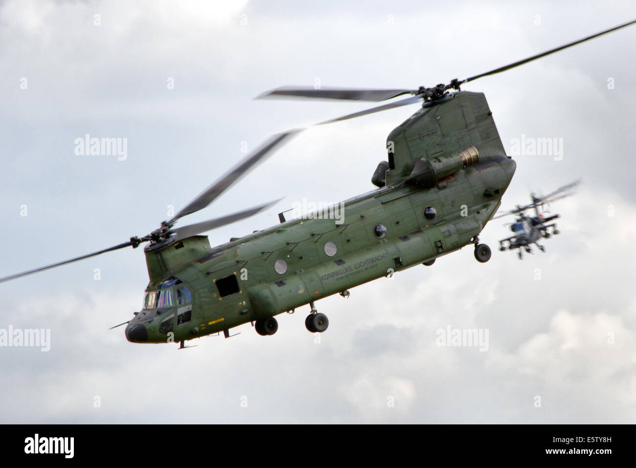 Dutch Air Force CH-47 Chinook and AH-64 Apache performing a display at the Royal Netherlands Open Days. Stock Photo