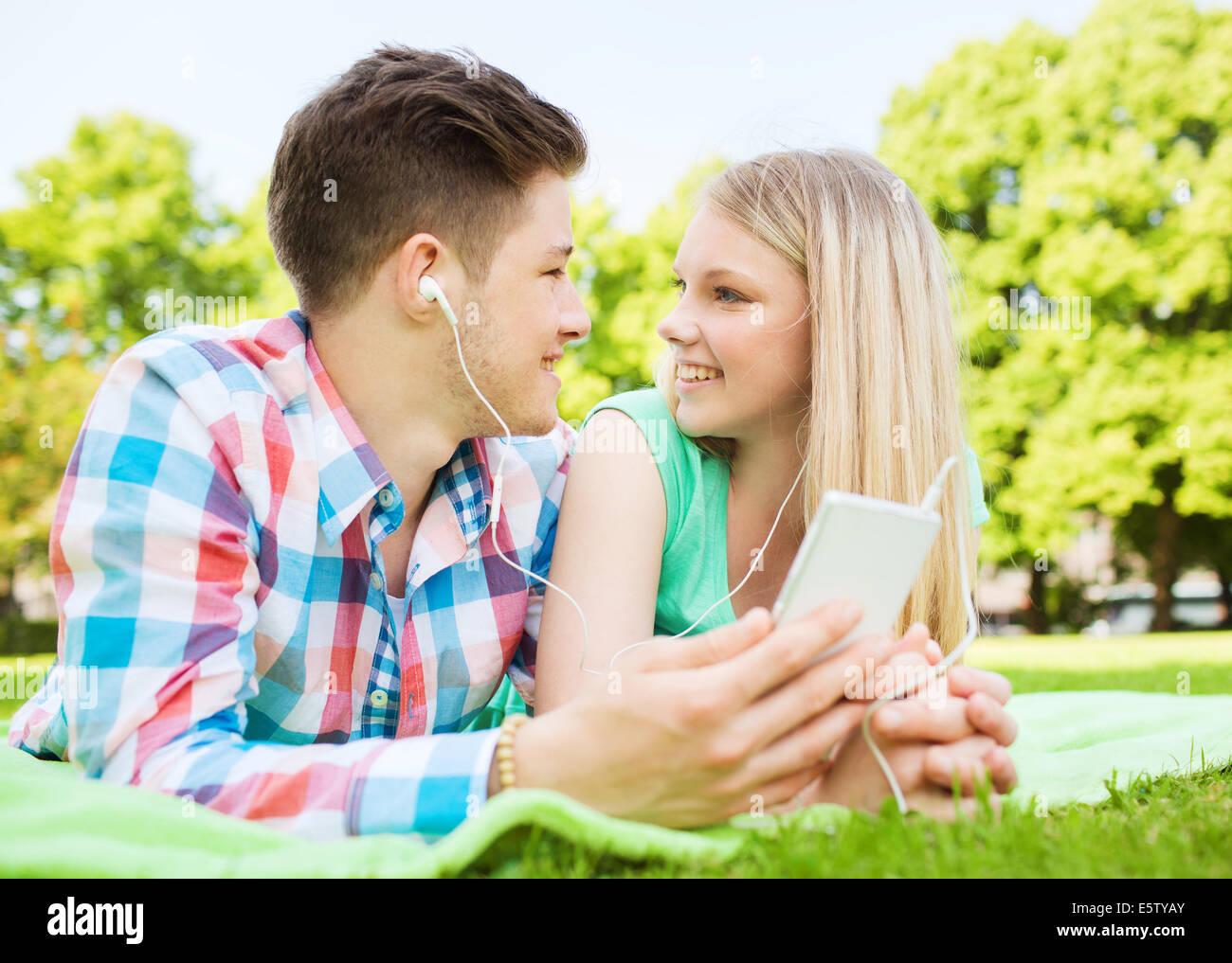 smiling couple in park Stock Photo - Alamy