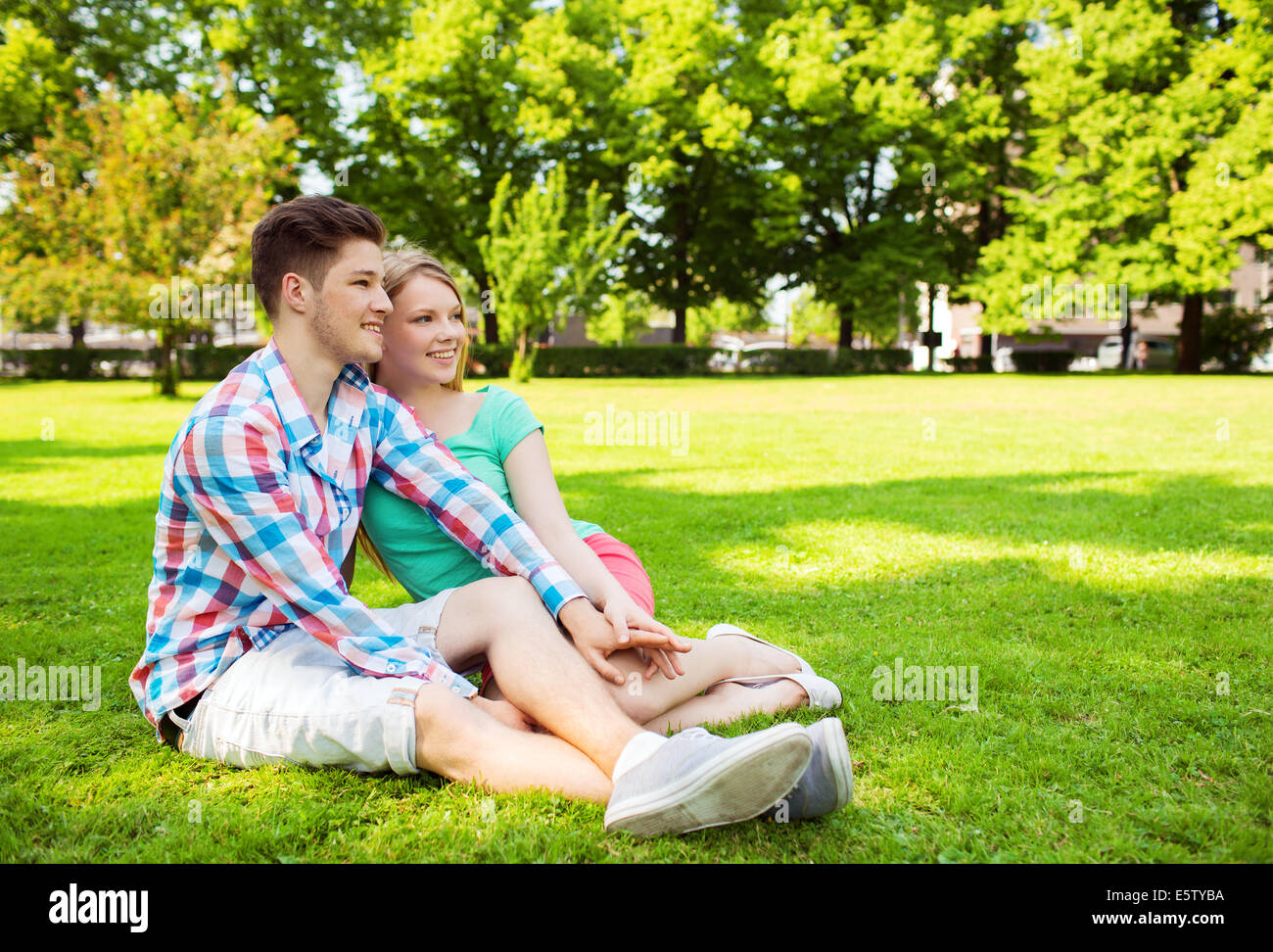 smiling couple in park Stock Photo - Alamy